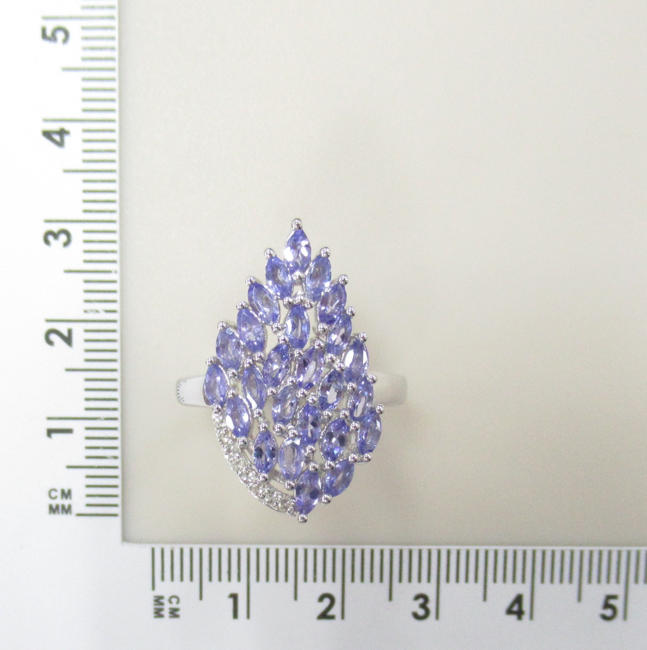 Серебряное кольцо 925 пробы; вставки 25 Танзанит 2ct; 8 Топаз белый 0,08ct ;